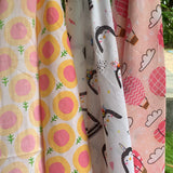 Muslin Swaddles flowers, penguins and hot air balloons